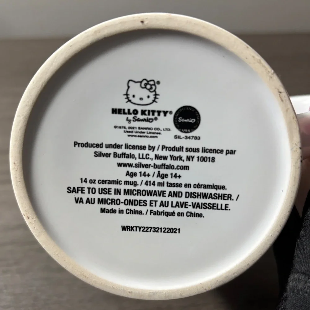 Sanrio Hello Kitty Coffe Mug White with Multiple Hello Kitty Faces 14oz Ceramic